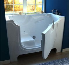 a white bath tub sitting next to a window