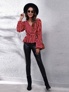 Introducing the Red Gingham Peplum Blouse, a vibrant addition to your wardrobe. This blouse features a striking red and white gingham pattern and a flattering peplum silhouette. Made from 100% polyester, it offers an opaque, comfortable fit without any stretch. Ideal for both casual outings and festive events, this blouse pairs effortlessly with jeans, trousers, or skirts for a chic and polished look. Features: Bold gingham pattern Sheer: Opaque Stretch: No stretch Flattering peplum design Size & Fit: Size: S, M, L, XL Fit Style: Regular fit Materials & Care: Material: 100% polyester Care Instructions: Machine wash cold. Tumble dry low. Peplum Design, Peplum Designs, Red And White Gingham, Lantern Sleeve Top, Gingham Pattern, Red S, Red Gingham, Peplum Blouse, Tee Outfit