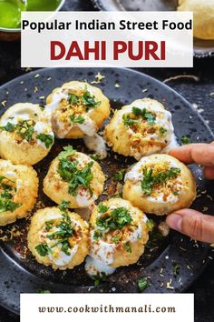 Dahi puri is an Indian snack/street food which has small fried semolina balls filled with yogurt, chutney and spices. It's sweet, tangy and, spicy and I bet you can't have one! Dahi Puri, Indian Cuisine Recipes, Refined Sugar Free Recipes, Vegetarian Indian, Paneer Tikka, Indian Street, Amazing Appetizers, Indian Street Food, Indian Snacks