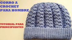 a crochet hat is shown with the words gorro a crochet para hombre