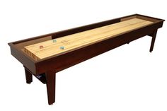 the shuffle table is made from wood and has three dices on each side,