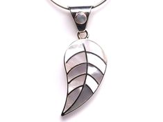 "// Mother of Pearl Leaf Inlay Pendant // Includes genuine gemstones! // This beautiful inlay pendant has been handcrafted in Peru. The craftsmanship is amazing! The metal is made of solid .950 sterling silver, which means it is a higher purity than standard .925 sterling silver.  The gemstones included are: Mother of Pearl We only have one of these pendants and you will receive the exact item in the photos! The pendant measures 5/8\" wide, and 1 5/8\" long including the bail.  Choose pendant on Leaf Jewelry, Sterling Silber, Peru, Mother Of Pearl, Sterling Silver Jewelry, Jewelry Necklace Pendant, Silver Jewelry, Jewelry Necklaces, 925 Sterling Silver