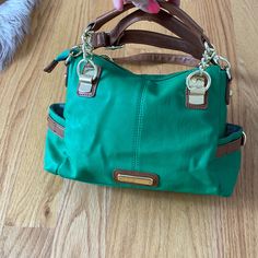 Brand New, Never Used Before, Great Quality, Has Multiple Compartments, Very Convenient, Attachable And Detachable Handles Green Bags With Adjustable Strap, Green Rectangular Bag With Metal Hardware, Green Travel Bags With Metal Hardware, Green Bag With Detachable Strap, Green Shoulder Bag With Adjustable Strap, Everyday Green Hobo Bag With Gold-tone Hardware, Green Hobo Bag With Gold-tone Hardware For Everyday, Green Hobo Satchel Bag With Gold-tone Hardware, Green Satchel Hobo Bag With Gold-tone Hardware