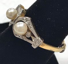 VINTAGE GORGEOUS 14K YELLOW GOLD PEARL AND DIAMOND RING SIZE 8.25 REALLY STUNNING! Ring features 3 - 4mm pearls surrounded by small bright genuine diamonds! Set in solid 14K gold. 3.8 grams Size 8.25, ring has a ring guard Please message me with any questions Will ship in a gift box Shipped insured/delivery confirmation I guarantee item to be exactly as described and pictured. Black Opal Pendant, Locket Ring, Ring Guard, Pearl And Diamond Ring, Citrine Ring, Initial Ring, Cute Rings, Size 10 Rings, Opal Pendants