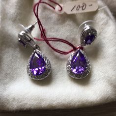 Teardrop Purple And Rhinestone Earrings. Teardrop Stone Earrings For Party, Teardrop Rhinestone Earrings For Gift, Elegant Teardrop Stone Earrings, Teardrop Crystal Earrings With Rhinestones For Gift, Teardrop Crystal Earrings With Rhinestones, Rhinestone Drop Earrings Gift, Elegant Purple Rhinestone Crystal Earrings, Purple Rhinestone Drop Earrings, Jeweled Teardrop Crystal Earrings Gift