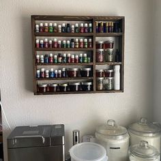 a shelf filled with lots of bottles and containers