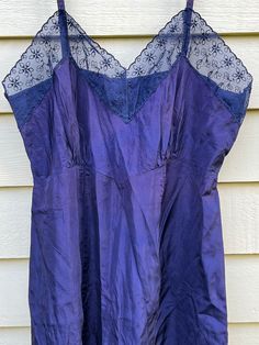 "The perfect cobalt blue rayon slip with lace trim. Adjustable straps. It is so hard to find this quality of blue in something that's not a poly blend. This is early rayon with a slight crinkle and sheen to it. Lovely gathering at the bodice. Falls perfectly at mid calf on most. Can be worn as a slip dress and not just as lingerie. Good vintage condition. Please note some very slight discoloration at bodice and a horizontal rip at back hem. The hem is an easy mend. I would suggest giving it a lo Cobalt Blue, Mid Calf, Cobalt, Lace Trim, Favorite Outfit, Camisole Top, Adjustable Straps, Slip Dress, Slip On