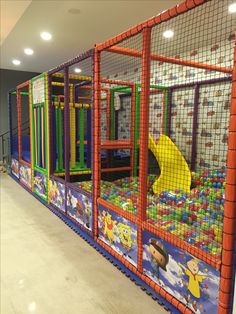 an indoor play area for children with toys