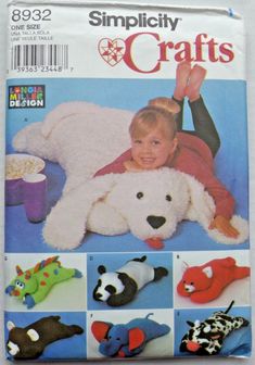 a child laying on top of a stuffed animal