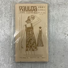 a sewing pattern for a women's dress with an apron and hat on it