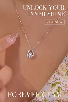 a woman wearing a necklace with the words, unlock your inner shine shop now foreverglam