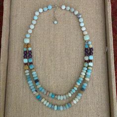 This Brand New Matte Amazonite & Amethyst 2x Necklace Is Hand-Knotted On Silk. Length: 18 1/2” W 1” Extender. Bracelets: Amazonite Stretch $15/Ea; Amazonite/Jasper/Crystal/Magnesite W Tassels $32. Sterling Silver Hook Clasp. Sundance Exclusive Handcrafted In Usa. Similar To Jade, Amazonite Is Associated With Money, Luck And Overall Success. It's Known As The "Gambler's Stone," Encouraging Good Luck And Fortune. Amazonite Is Said To Have A Soothing Effect. Tags: Chan Luu, Sundance, Garnet Hill, F Amazonite Necklace, Garnet Hill, Chan Luu, Hook Clasp, Candy Shop, Gemstone Necklace, Shop Necklaces, Good Luck, Womens Jewelry Necklace