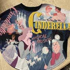 there is a t - shirt with an image of cinderella on it