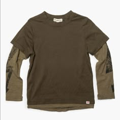 Appaman Repo Long Sleeve Boys Shirt Military Olive Color. Appaman's Repo Long Sleeve Boys Shirt Is A Two-Toned Layered Shirt With Distressed Arrow Printing Down The Sleeves. 100% Cotton, Machine Wash Silly Clothes, Slouchy Sweatshirt, Estilo Real, Female Fitness, Boys Shirt, Long Trousers, Dream Clothes, Boys Shirts, Boys T Shirts