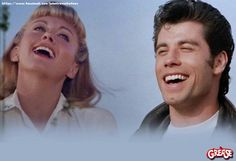 a man and woman laughing together in front of a blue background with the words grease on it