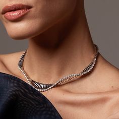 Ref. FF164NE42 Vito necklace, White Gold, White Diamonds. The Vito choker necklace, made of 18K white gold, gently ripples against the wearer's neckline and sparkles with white diamonds, emphasizing its natural movement. Gold: g 34.00 | White Dia: ct 3.15 | Sapphires: ct 0.04All weights are approximate. Slight variations may occur due to the nature of handmade craftsmanship. Luxury White Gold Metal Necklace, Luxury White Faceted Jewelry, Luxury White Gold Choker, Luxury White Gemstone Accent Necklace, Luxury Metal Pendant Choker, Paper Bracelet, Beautiful Dream, Gold Choker, Champagne Diamond