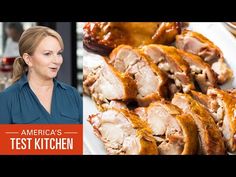 a woman standing in front of a plate of food with meat on it and the words america's test kitchen