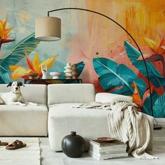 a dog sitting on top of a white couch in front of a colorful wall mural