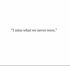 the words i miss what we never were are written in black on a white background