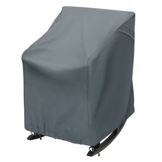 an outdoor chair covered in a gray cover