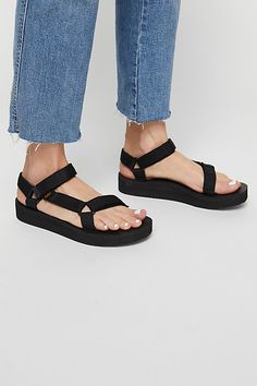 Designed for ultimate comfort, this much-loved sandal by Teva features simple fabric straps.* Hook-and-loop closures* Rubber sole Teva Midform Sandals Outfit, Black Tevas, Teva Sandals Outfit, Black Teva, Teva Sandal, Best Nursing Shoes, Teva Midform, Sandals Outfit Summer, Sandals Outfits