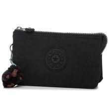 This indispensable pouch slides very easily into your handbag and gives you some more practical storage. Perfect for safeguarding your passport, money, keys and little beauty essentials. Dimensions: 7"L x 4"H x 1"D in. Black Pencil Case With Removable Pouch, Functional Cosmetic Bag With Pen Slots For Travel, Black Pencil Case With Removable Pouch For Everyday, Versatile Rectangular Pencil Case With Removable Pouch, Trendy Pencil Case With Removable Pouch For Daily Use, Trendy Pencil Case With Removable Pouch, Trendy Travel Wallets In Rectangular Shape, Trendy Travel Wallets In Rectangular Case, Trendy Rectangular Travel Wallet