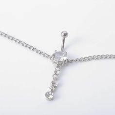 Description:Minimalist Crystal Navel Piercing Belly ChainSpecification:Chain Size: 35" + 2.7"Color:SilverMaterial:Iron.CrystalWeight:0.5 oz/pcsQuantity: 1 pcs Waist Chain with belly ringFeatures & Details:This is a unique. trendy and simple Surgical Steel belly ring with chain created in our Uberjewellery ShopAll our Queenchal jewelries are crafted. packed and shipped with great love & care.Our aim will be delivering the best quality piecing jewelry with reasonable the price you pay.It's a wonderful accessory and decoration which is a Great Gift for Ladies.Mother. Girls. Lovers. Friends. Aunt and your beloved ones :-)Perfect for all occasions: anniversary. engagement. party. meeting. wedding. daily wear. etc.Any question regarding our product or service. please don't hesitate to send messa Silver Clavicle Chain Body Jewelry For Gift, Minimalist Silver Body Jewelry For Party, Silver Metal Body Jewelry With Adjustable Chain, Silver Adjustable Chain Body Jewelry, Nickel-free Stainless Steel Silver Body Jewelry, Nickel-free Silver Stainless Steel Body Jewelry, Adjustable Silver Metal Body Jewelry, Silver Stainless Steel Jewelry With Rhinestones, Silver Chain Body Jewelry