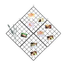 a black metal grid with pictures on it