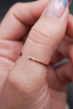 The Open Stacker Ring is an unsoldered piece. Because it is open it is slightly adjustable and could even be worn on different fingers depending on the size! This ring makes for the perfect thumb ring and is an excellent accent piece for a wedding band. This listing is for ONE SINGLE RING made in 14K ROSE GOLD FILL metal. The open design allows you to effortlessly accentuate your gemstone, making it the perfect addition to any ring stack. Every piece is organic and unique — no two Hannah Naomi p Stacker Rings, Single Ring, Ring Stack, Thumb Ring, Open Design, Thumb Rings, Metal Wire, Stacking Rings, Accent Pieces