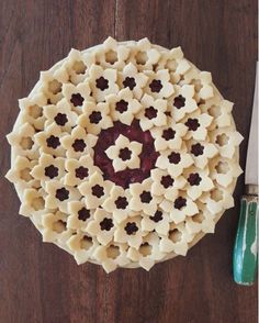 the pie has been cut into smaller pieces and is ready to be served on the table