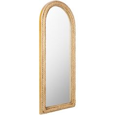 a wooden mirror sitting on top of a white wall