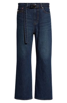 Chitose Abe blends a drapey squeeze-buckle belt and a zip-bisected coin pocket into the cropped silhouette of these bootcut jeans in nonstretch Japanese denim. 25" inseam; 17" leg opening; 11 1/2" front rise; 16" back rise (size 2) Zip fly with button closure Removable belt Five-pocket style 100% cotton Dry clean or machine wash, dry flat Made in Japan Designer Clothing Asian & Pacific Islander Owned/Founded Denim Blue Cropped Leg Flare Jeans With Belt Loops, Cropped Leg Dark Wash Flare Jeans With Belt Loops, Fall Workwear Cropped Jeans With Belt Loops, Cropped Jeans With Belt Loops For Fall Workwear, Modern Cropped Leg Flare Jeans With Belt Loops, Modern Cropped Flare Jeans With Belt Loops, Modern Cropped Flare Jeans, Fall Dark Wash Cropped Jeans With Belt Loops, Straight Leg Denim Blue Belted Jeans