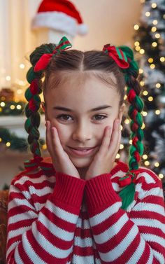 Girl with festive red and green braided pigtails decorated with holiday ribbons. Crazy Christmas Hairstyles For Kids, Christmas Hair Ideas For Kids, Holiday Hairstyles For Kids, Braids With Red, Easy Crazy Hairstyles, Hair Ideas For Kids, Easy Crazy Hair Day, Easy Holiday Hairstyles, Red And Green Hair