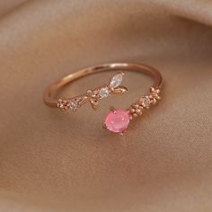 📌 Please Note: When adjusting the ring, please squeeze or expand the ring body slowly and gently. 💎 Materials: 14k Rose Gold Electroplated - more durable than regular platings Cubic Zirconia Eco Resin 📐 Size: Adjustable Open Design - Size 5+ Adjustable Pink Rings For Proposal, Rose Gold Open Ring For Proposal, Adjustable Rose Gold Open Crystal Ring, Pink Adjustable Open Midi Ring, Adjustable Rose Gold Flower Toe Ring, Adjustable Rose Gold Flower Ring, Adjustable Rose Gold Flower Ring For Promise, Aurora Ring, Eco Resin