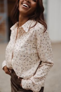 Get ready to sparkle and shine in our Val Blouse! Made with cream sequin fabric featuring delicate floral detailing, this women's top is sure to turn heads. The scoop neckline and button up style make it both stylish and nursing friendly. Complete with long flowy sleeves and a fully lined interior. Long Flowy Sleeves, Button Up Style, Capsule Wardrobe Women, City Woman, Flowy Sleeves, Nursing Friendly, Sparkle And Shine, Flowy Blouse, Work Tops