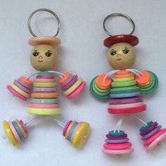 two key chains made to look like toys