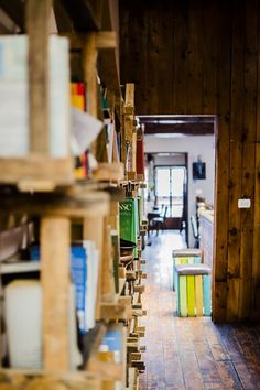 there are many stacks of books on the shelves in this room that is full of books