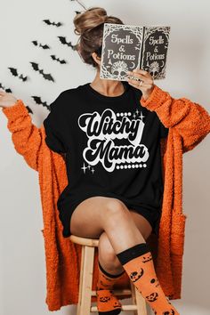 Witchy Mama Shirt, Bad Witch Shirt, Halloween Shirt, Halloween Shirts for Moms, Halloween Tshirts for Women, Halloween Gift, Witchy gift 🟢 HOW TO ORDER 🟢 1. Check and Review ALL Photos 📷 2. Select Your T-Shirt Style, Size and T-Shirt Color from drop down menus ✨ 3.Select Your Design Print Color from images and mention in personalization section (Optional)🎨 4. Add to cart & place order 🛒 We're constantly striving to provide excellent service. We'd love to get your feedback :) 🚚📦 SHIPPING & Black Witchy Tops With Letter Print, Black T-shirt With Letter Print For Costume Party, Funny Halloween Letter Print Shirt, Funny Halloween Shirt With Letter Print, Spooky Letter Print T-shirt For Costume Party, Halloween Long Sleeve Shirt With Letter Print, Spooky Halloween Shirt With Letter Print, Witchy Letter Print T-shirt For Fall, Halloween Costume Party T-shirt With Letter Print