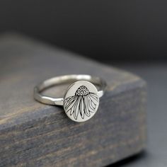 Engraved Flower Ring, Womens Stacking Ring, Custom Ring, Sterling Silver Ring, Echinacea Flower, Bridesmaid Ring, Mothers Ring New To LittleGreenRoom! This custom order cone flower ring is just gorgeous! Elegant in style and design and a great ring to add to any ring wardrobe for the season. *Custom* Made To Order Ring~ This is a custom order! Please read shop announcement for updates on processing times for custom orders. Processing times do not include shipping times. Featuring.. ★This listing Echinacea Flower, Flower Bridesmaid, Argentium Silver Jewelry, Bridesmaid Ring, Botanical Ring, Mothers Ring, Bridesmaid Rings, Unique Silver Jewelry, Engraved Flower