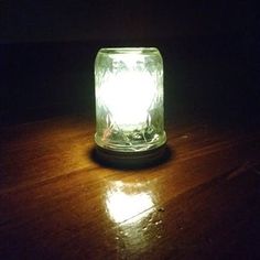 a light that is on top of a wooden table