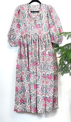 Indian Blockprint Pure Cotton Everyday Midi Dress Summer Earthy Elegant Comfy wear Beach Outfit Daily Wear Cotton Dress Bomull Lång Klänning This elegant pur cotton Blockprint ankle length dress is going to be your all time favourite dress! Pure cotton is most gentle on skin and easy to care . Its used Azo free dyes to make it more eco friendly. It has a pocket for your essentials. Its relaxed balloon sleeves .makes it so beautiful and comfortable. Handmade cotton strings around the neck adds gi Patterned Printed Dress For Garden Party, Holiday Floral Print Short Sleeve Maxi Dress, Holiday Floral Print Maxi Dress With Short Sleeves, Floral Print Short Sleeve Maxi Dress For Holiday, Holiday Maxi Dress With Floral Print And Short Sleeves, Short Sleeve Maxi Dress With Floral Print For Holiday, Bohemian Floral Print Holiday Dress, Patterned Printed Dresses For Daywear, Bohemian Smock Knee-length Dress