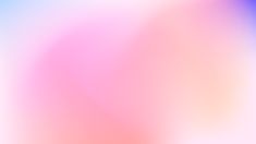 a blurry image of an orange, yellow and pink background with the same color