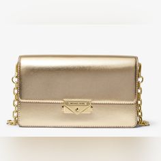 Clutch Metallic 100% Polyurethane Gold-Tone Hardware 8.75"W X 5.5"H X 2.75"D Adjustable Strap: 20.5" Exterior Details: Back Slip Pocket Interior Details: 3 Front Card Slots Lining: 100% Polyester Push-Lock Fastening Imported Style # 35f2g0ec6m Gold Rectangular Flap Bag With Branded Hardware, Gold Flap Bag With Metal Hardware For Travel, Gold Shoulder Flap Bag With Branded Hardware, Gold Rectangular Flap Bag With Metal Hardware, Gold Leather Flap Bag With Branded Hardware, Modern Gold Flap Bag With Branded Hardware, Gold Crossbody Flap Bag With Branded Hardware, Gold Flap Bag With Branded Hardware For Travel, Gold Leather Bags With Branded Hardware