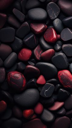 red and black rocks are arranged together