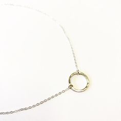 This listing is for one sterling silver or 14k gold fill hand made hammered infinity (karma, hoop, eternal circle) charm necklace on a SS or 14k gold fill cable chain. The necklace in the pictures above are stock photos but are very similar to what you will receive. All necklaces are made to order on the island of Kauai. Please chose your finish upon check out and if you have any questions or special request feel free to convo me. I can adjust chain length as needed. The necklace measures approx Dainty Circle Charm Necklace In Sterling Silver, Dainty Sterling Silver Circle Charm Necklace, Sterling Silver Circle Charm Necklace With Delicate Chain, Nickel-free Open Circle Jewelry For Everyday, Dainty Open Circle Charm Necklaces For Everyday, Dainty Everyday Charm Necklaces With Open Circle, Dainty Full Circle Sterling Silver Jewelry, Sterling Silver Hoop Necklace As A Gift, Minimalist Nickel-free Infinity Jewelry