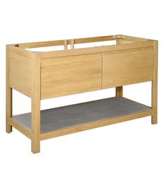 the baby crib is made from wood and has two drawers on one side, and an open drawer on the other