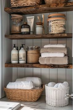 the shelves in this bathroom are filled with towels, soaps and other things to use