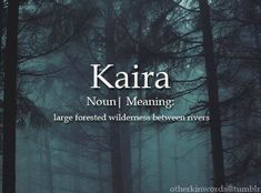 there is a forest with trees and the words karra in white letters on it