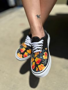 Get floral with these custom poppy flower Vans authentic sneaker. We buy each pair of shoes BRAND NEW. Each pair is made to order, please make sure you put in the correct shoe size before you check out. The ink is permanent and will never come off, fade away, or peel off. Made in the USA. This price includes everything: shoes, artwork, and shipping. Thanks for stopping by our Etsy shop! Please message me with any questions! Because the artwork is custom made for you, there are no exchanges or returns. If you have any issues with your order, please feel free to reach out to us and we will be more than glad to help you! Please know your size before ordering. Sizes listed are in US sizing scale. Please note that colors of actual item may slightly differ from what you see on your screen due to Floral Print High-top Sneakers For Streetwear, Floral Print Low-top Sneakers For Streetwear, Sporty Floral Print Sneakers For Streetwear, Orange Poppy Flower, Shoes Artwork, Black Slip On Vans, Vans Painted, Chuck Taylor Shoes, Painted Vans