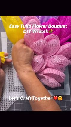 someone is making flowers out of fabric on a table with the words easy tulip flower bouquet diy wreath